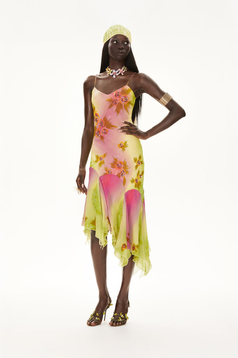 The Coral 100% silk midi-length cocktail gown by CyberSweetie featuring a pink and green gradient watercolor print and artisan hand beadwork.