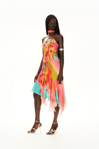 CyberSweetie Tulipa gown featuring hand-painted flowers, glistening gem embellishments, and a handkerchief hem. Whimsical 2000s-inspired hand-painted floral gown with a handkerchief hemline, perfect for a standout wedding guest look.