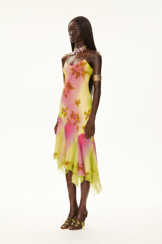 Iconic 2000s-inspired watercolor silk midi dress with an asymmetrical cut, perfect for a romantic wedding guest look.