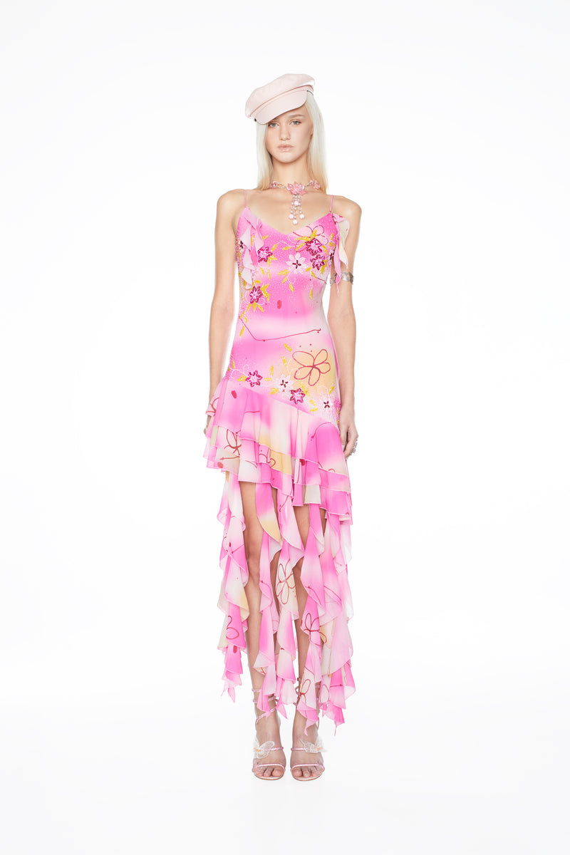 Playful hand-beaded mini dress by CyberSweetie featuring a soft ruffled skirt, a bias-cut fit, and a matching shawl.